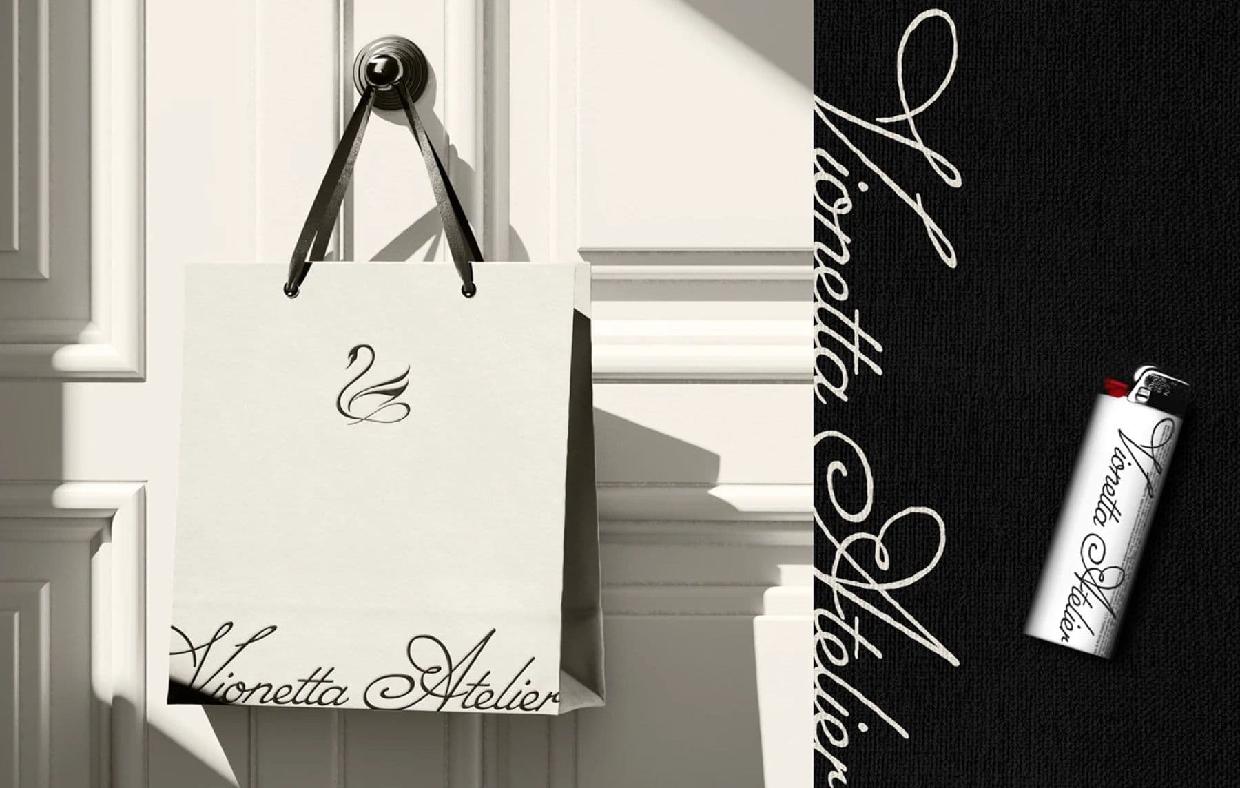 Vionetta Atelier shopping bag and lighter printed with the script wordmark