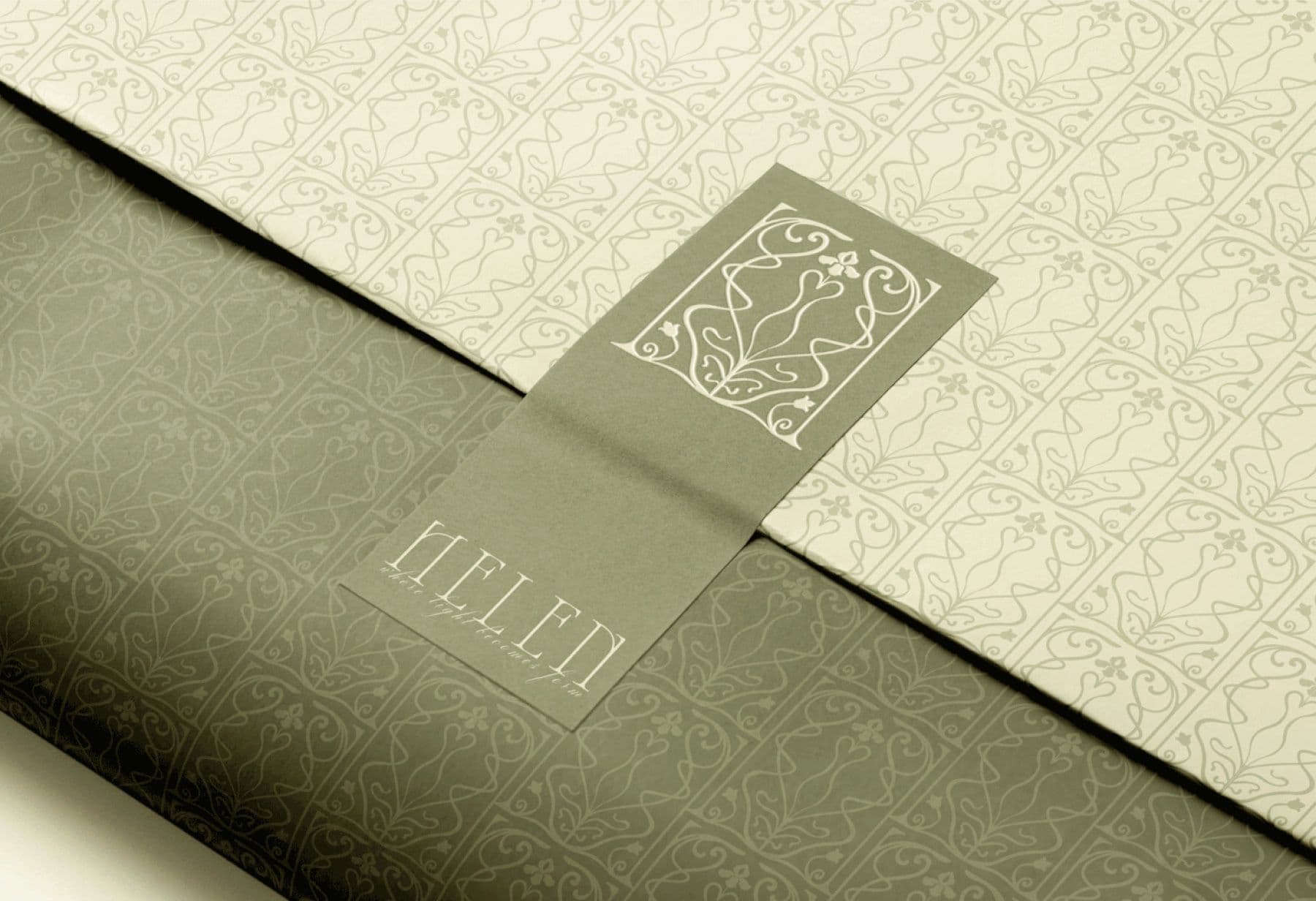 Helen patterned wrapping paper sealed with an emblem sticker