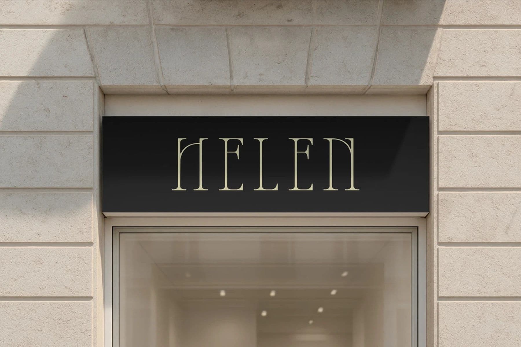 Helen storefront sign on a stone facade
