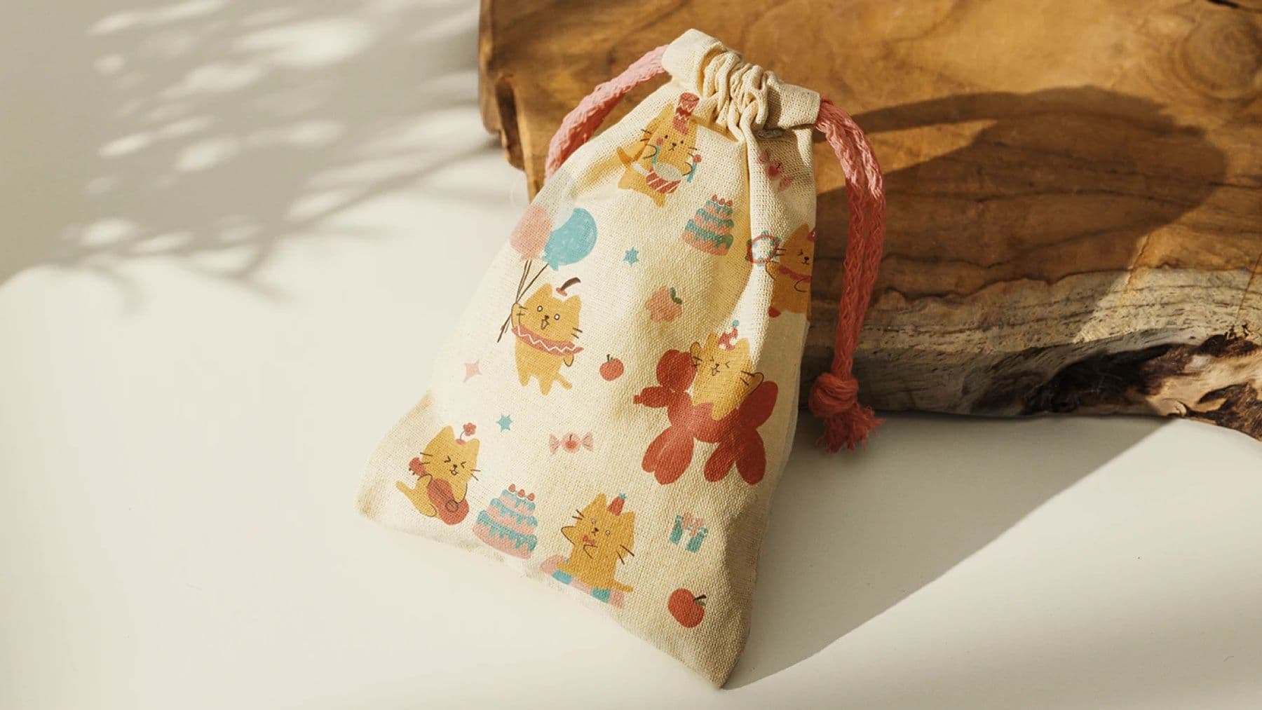 Appleberry & Co drawstring pouch printed with mascot characters